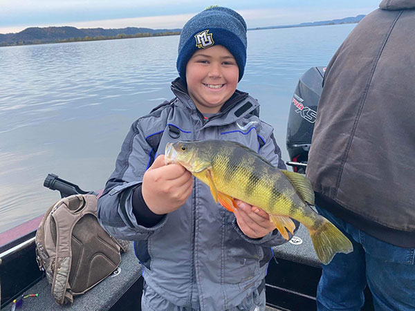 Kid with yellow perch